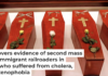 Caskets of Irish railroaders whose remains were excavated from a mass grave outside Philadelphia. AP Photo/Matt Rourke